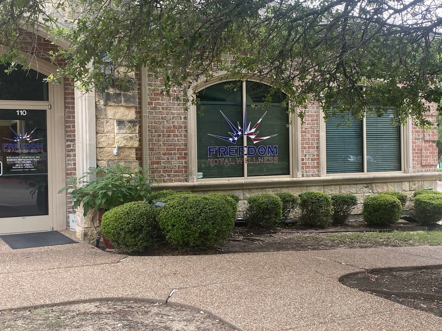 Freedom Total Wellness clinic storefront in Frisco, Texas